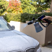 MTM Foam Cannon connected to MTM Short Gun spraying thick foam onto black BMW