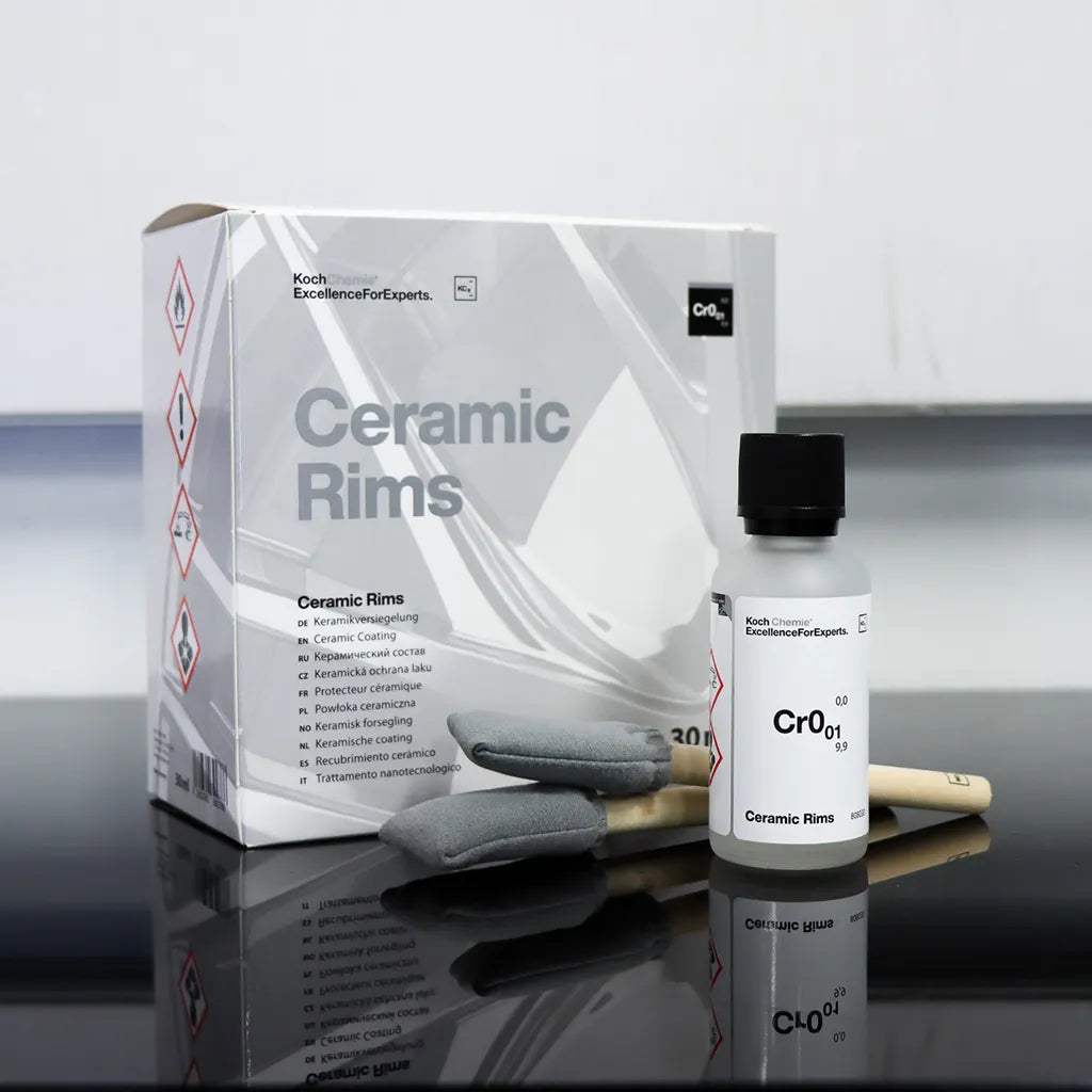 Koch Chemie Ceramic Rims Cr0.01 | Ceramic Coating for Painted Rims box with bottle and brushes in the foreground. 