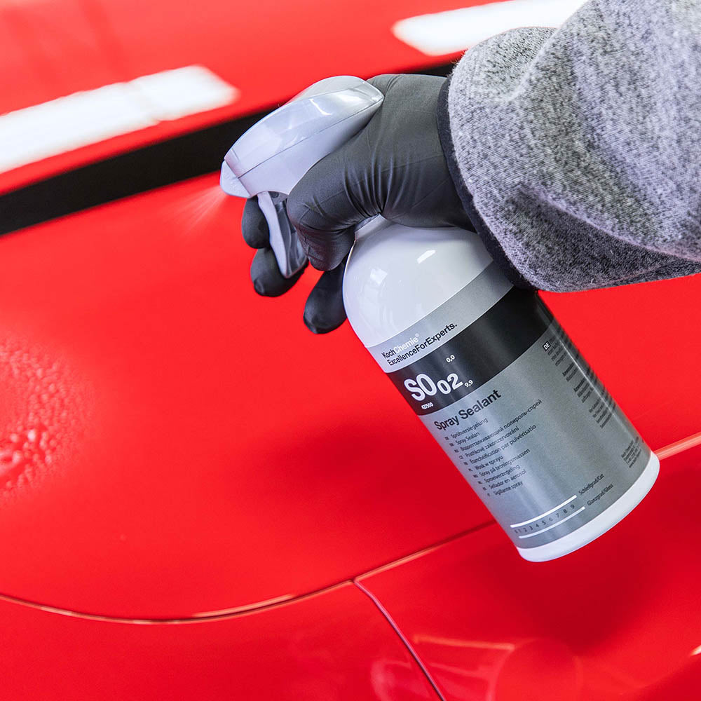 Koch Chemie Spray Sealant | High Gloss Hydrophobic Spray being sprayed onto a red bonnet of a car.