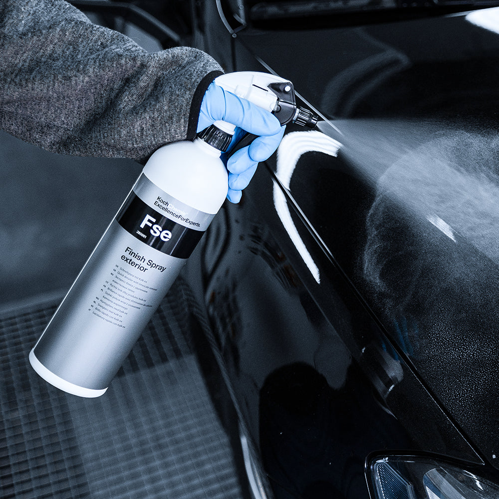 Koch Chemie Finish Spray Exterior | Limescale Remover 1L bottle being sprayed onto a black BMW.